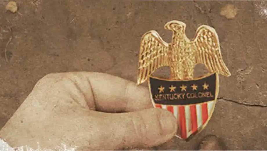 Medalla del Coronel Sander Aguila y Escudo